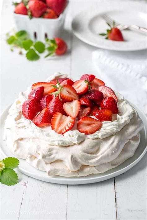 Pavlova (pav) is a meringue cake that has a light and delicately crisp crust with a soft marshmallow center. Strawberry & Mascarpone Pavlova Recipe - Saving Room for ...