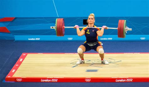 I want to start doing some crossfit along with oly lifting. Fichier:Olympics 2012 Women's 75kg Weightlifting.jpg ...