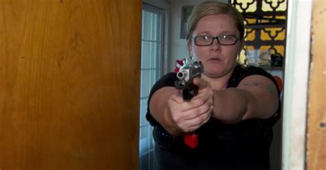 Fearless Mother Holds Intruder At Gunpoint After Daughter Sees Strange Man In Garage