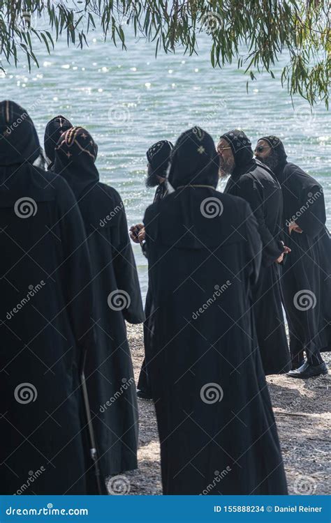 Coptic Monks Visiting The Shore Of Sea Of Galilee In Tabgha Church
