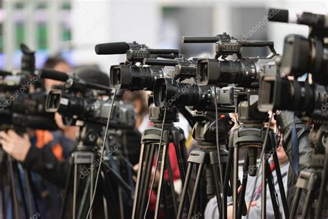 Row Of Tv Cameras At Public Event — Stock Photo © Microgen 115434570