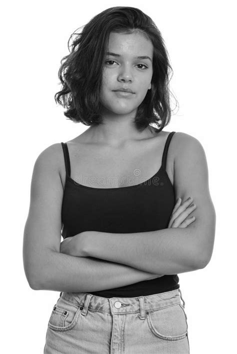 Young Beautiful Multi Ethnic Teenage Girl With Arms Crossed Stock Image