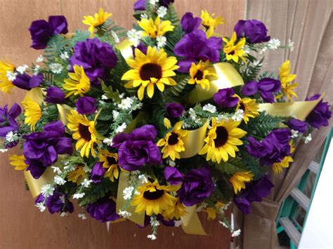 And bright filler flowers forward facing vase. Fall cemetery tomb topper using purple roses, and yellow ...