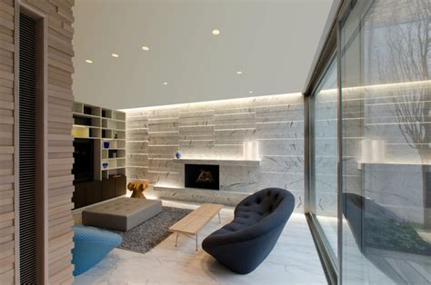 Wall grazing lighting accentuates textured, vertical surfaces by exaggerating their shadows. Stratus Warm White Linear Wall Grazer by Pure Lighting ...