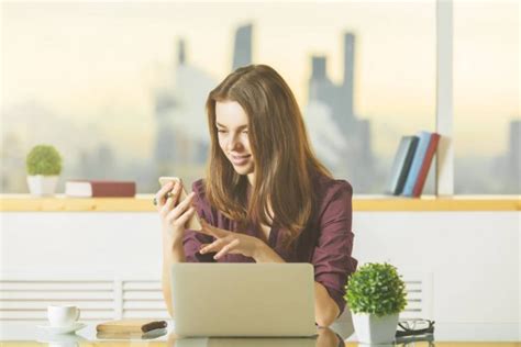 Attractive Lady Using Cellphone And Laptop Stock Image Everypixel