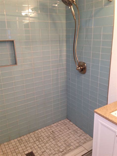 In terms of looks glass tiles are quite transparent and reflect a good deal of light, making spaces seem larger. Beautiful Shower remodel using Vapor Glass Subway Tile ...