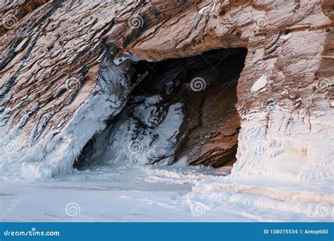 Cave Entrance In Snow Covered Rock Stock Photo Image Of Grotto Cold