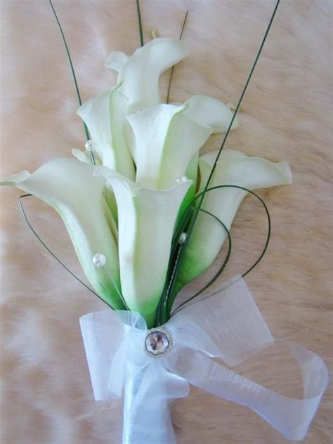 Stunning White Calla Lilies Designed In An Arm Sheaf Style Bouquet