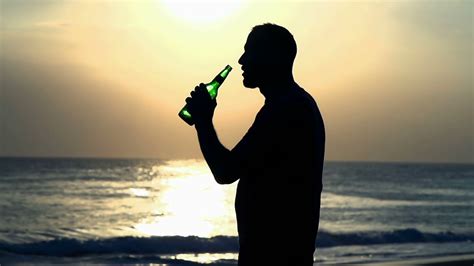 Man Drinking Beer On Beach During Sunset Stock Footage Sbv 319096860