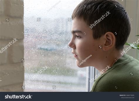 Portrait Sad Boy Looking Out Window Stock Photo 1686573835 Shutterstock