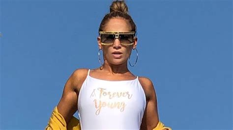 Jennifer Lopez Proves She S Fearless With Sexy Swimsuit Photo Shoot On Yacht Diving Board Access
