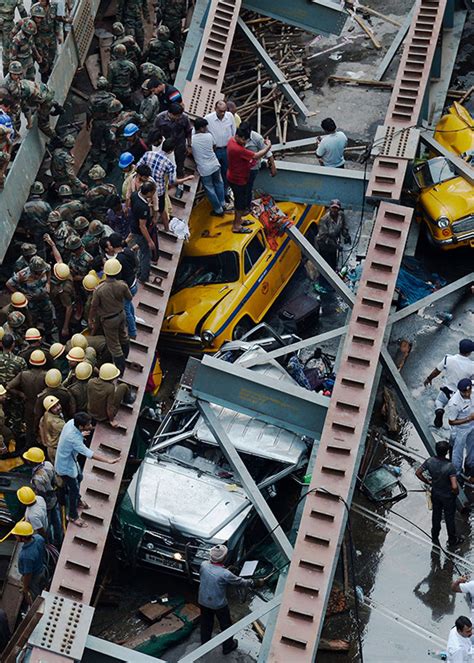 India Rescue Efforts After Kolkata Flyover Collapse Traps More Than 100 Graphic Images