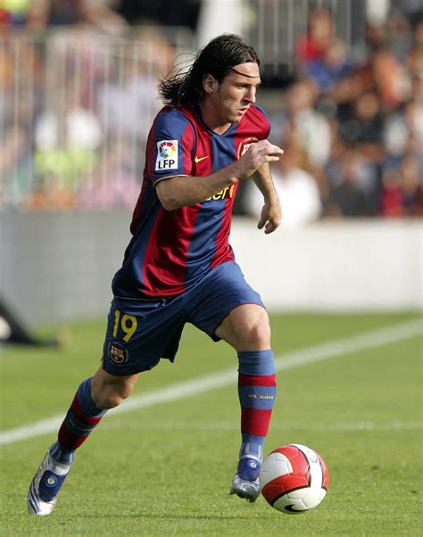 World Top Sports Players Lionel Messi In Action Wallpaper