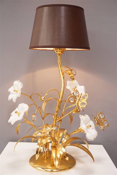 Who has carried our products? Gilt Metal Murano Glass Flowers and Crystal Butterflies ...
