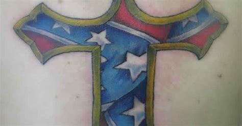 Most tats of the rebel flag will be simple, just a representation of the flag itself, but you might want to embellish the flag with additional symbols that mean something to you. Rebel flag cross tattoo | tattoo ideas | Pinterest | Rebel ...
