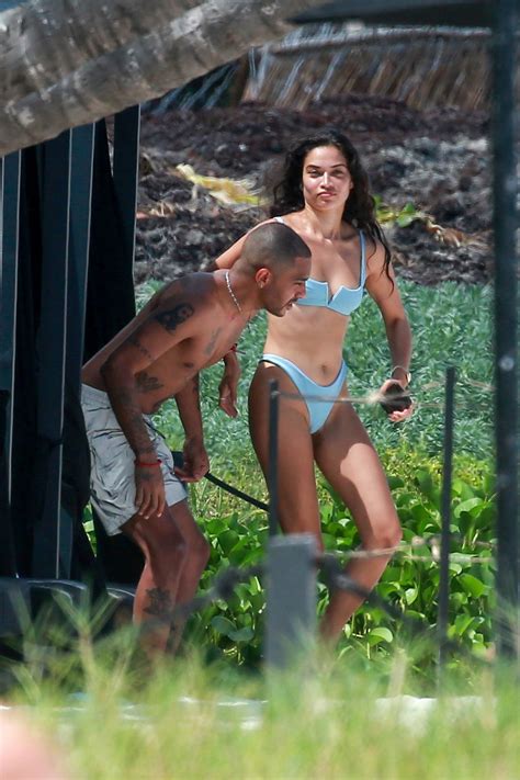 Shanina Shaik Slips Into A Blue Bikini As She Cools Off In The Ocean During Her Vacation In
