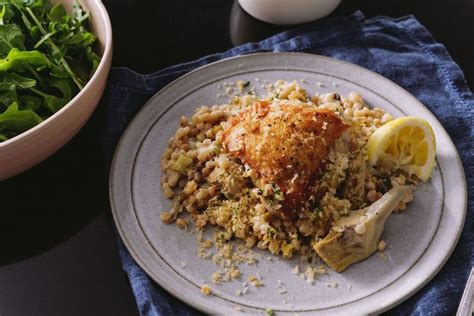 Transfer two chicken thighs and a few tomatoes to each plate. Roasted Chicken Thighs With Artichokes & Pearl Couscous ...