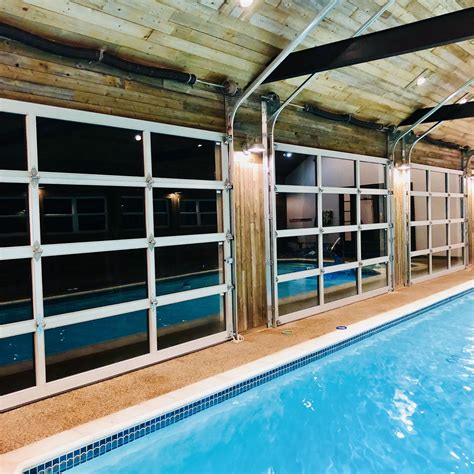 Indoor Pool With Glass Garage Doors Indoor Pool House Small Indoor