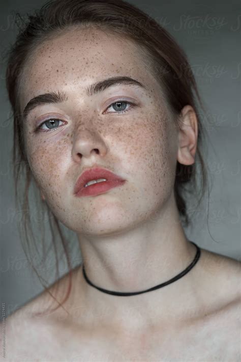 Face Of A Beautiful Girl With Freckles Close Up By Andrei Aleshyn