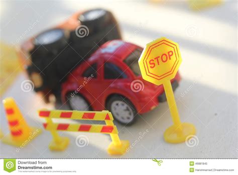 Car Accident Zone Cordoned Off With A Yellow Stop Sign Post Stock Image