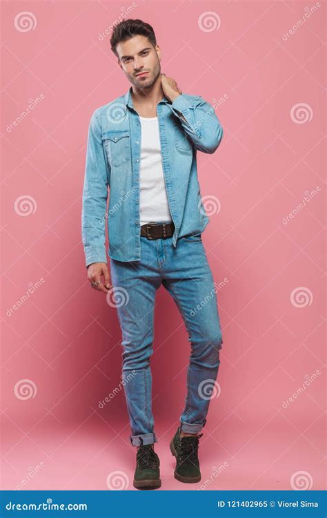 Handsome Man Wearing Undone Denim Shirt And Jeans Standing Stock Image Image Of Male Smile