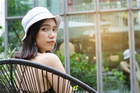 thai girl in black dress sitting at cafe stock image image of hair attractive 140509517