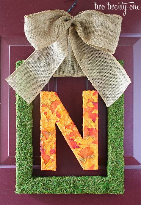 The best fall wreaths incorporate coveted seasonal elements like pumpkins, colorful fallen leaves, and burlap. Fall Monogram Wreath {DIY}