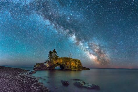 Milky Way Galaxy Over Hollow Rock Sea Stack In Lake Superior Near Grand
