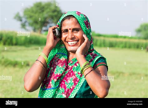 Smiling 1 Indian Rural Woman Housewife Talking On Mobile Phone Stock
