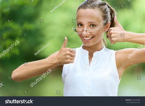 Pretty Young Woman Showing Gesture That Everything Is Ok, Against Green ...