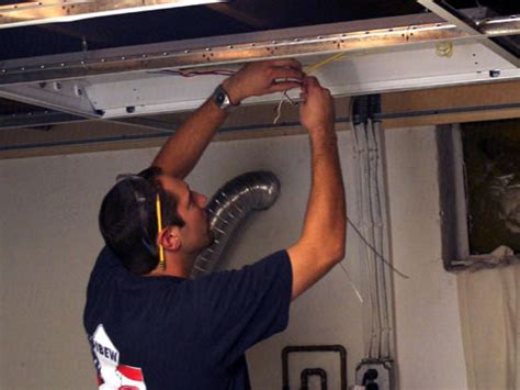 This creates a stylish atmosphere. Installing a Drop Ceiling in a Basement Laundry | HGTV