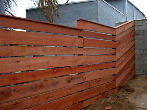 How To Build A Horizontal Plank Fence In A Hillside Backyard Hgtv