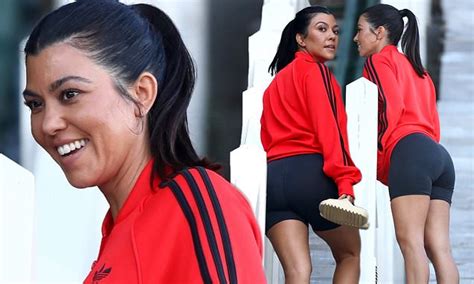 Kourtney Kardashian Flaunts Her Pert Derriere In Bike Shorts At Her