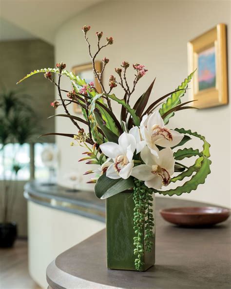 Cymbidium Silk Orchid Aloe And Budded Branch Arrangement At Modern Flower