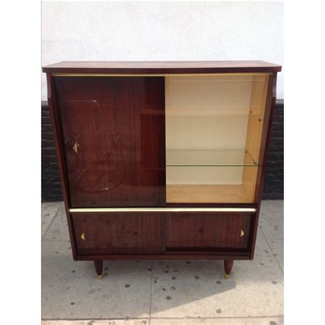 Choose wood and stain for this beauty made in amish country. Vintage 1950s Curio Cabinet | Chairish
