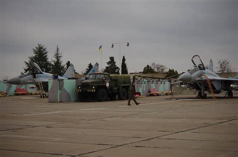 Russian Military Armed Surrounded Air Base And The Airport In