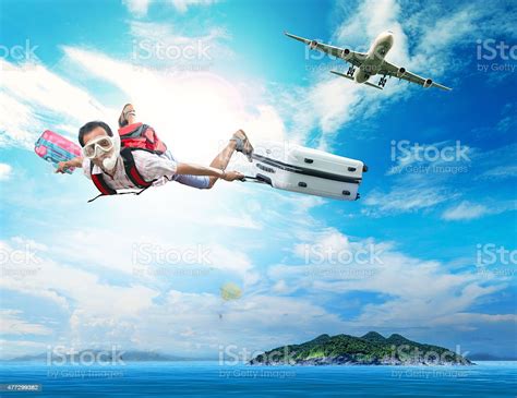 Traveling Man Flying From Plane To Sea Destination Stock Photo ...