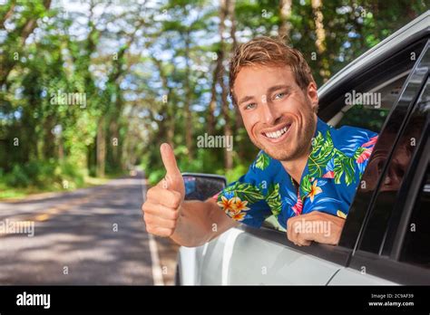 Happy Car Driver Man Driving Safe On Road Trip Travel Doing Thumbs Up