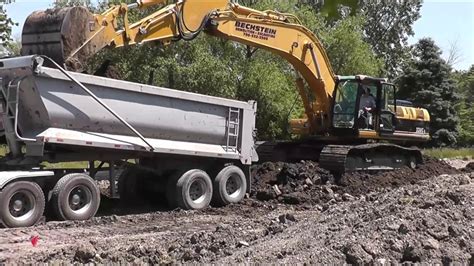 Cat C Excavator Loading A Dump Truck YouTube