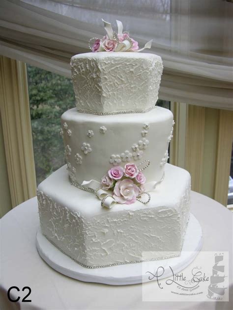 Beautiful, fresh flowers from small nearby farms. C2 - Delicate Fondant Wedding Cake With Small Pink Flowers