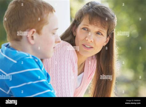 A Mother Talking To Her Son Stock Photo Alamy