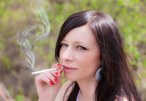 Premium Photo Pretty Woman Smoking