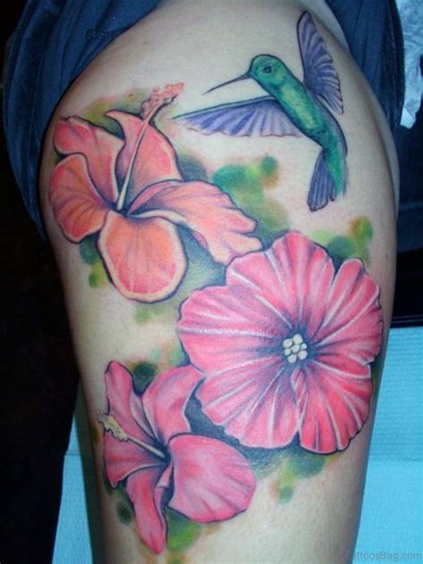 The most popular hawaiian flower tattoo is the hibiscus and is the hawaii state flower. Evergreen Flowers Tattoos On Thigh