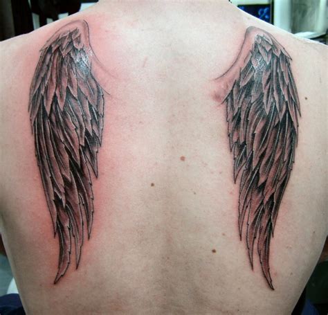 Beautiful Wing Tattoo On Back For Women