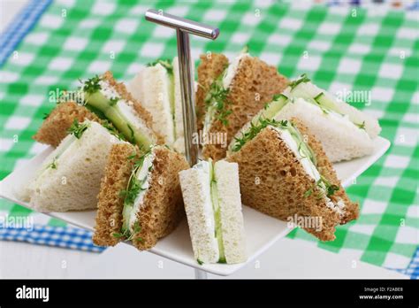 Cream Cheese And Cucumber Sandwiches On Checkered Cloth Stock Photo Alamy