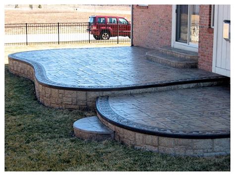 Rockford stamped concrete did an excellent job adding an addition to my drive way. Stamped Concrete Patios PATIO WITH STAUNED WAVE BORDER ...