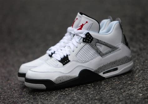 Dressed in a white, gorge green, and varsity red color scheme. Nike Air Jordan 4 OG 89 White Cement 2016 - Sneaker Bar Detroit