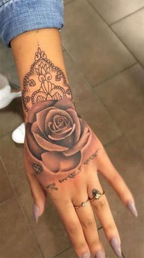 40 Interesting Hand Tattoos Ideas For Women Hand Tattoos For Women Rose Hand Tattoo Wrist