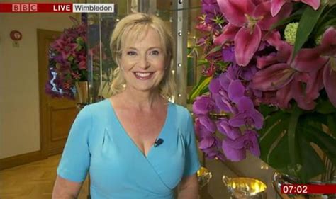 Carol Kirkwood Puts On Seriously Busty Display In Plunging Blue Dress