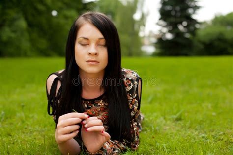 Woman Relaxing Outdoors Smiling Stock Image Image Of Field Girl